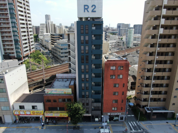 大阪府大阪市　11階建マンション　外壁部分塗装